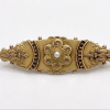Antique 9 carat gold brooch with marquise design and floral elements